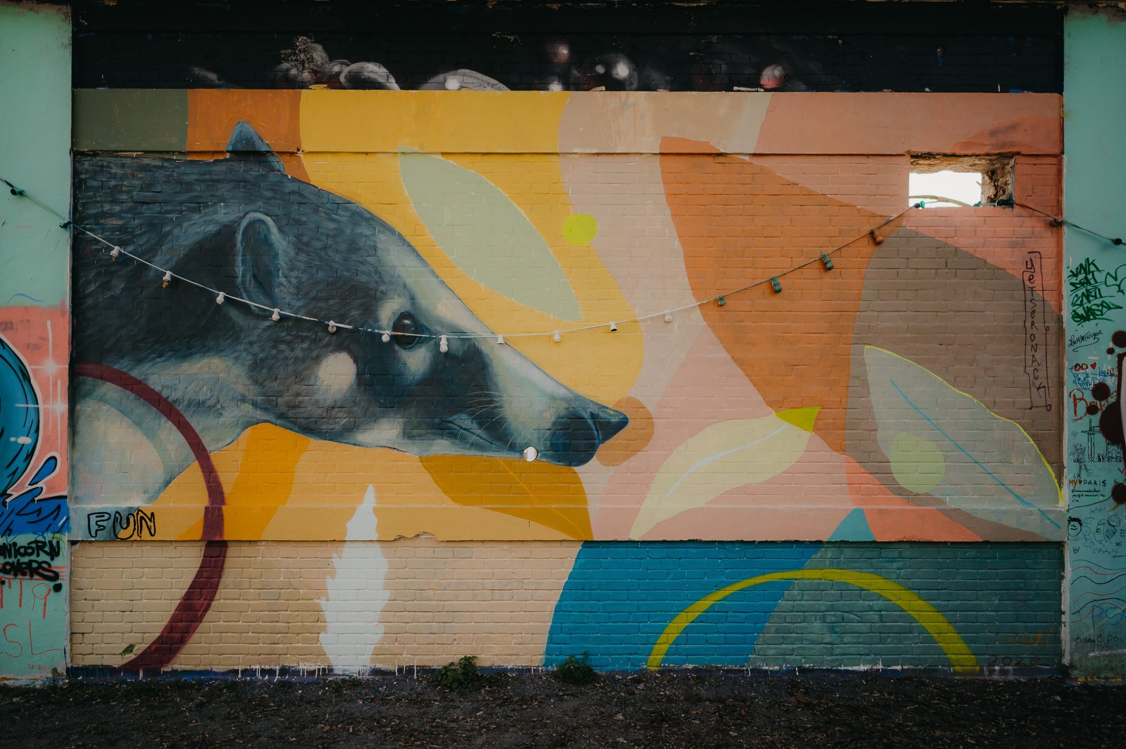tag d'un rat sur un mur en brique à Darwin
